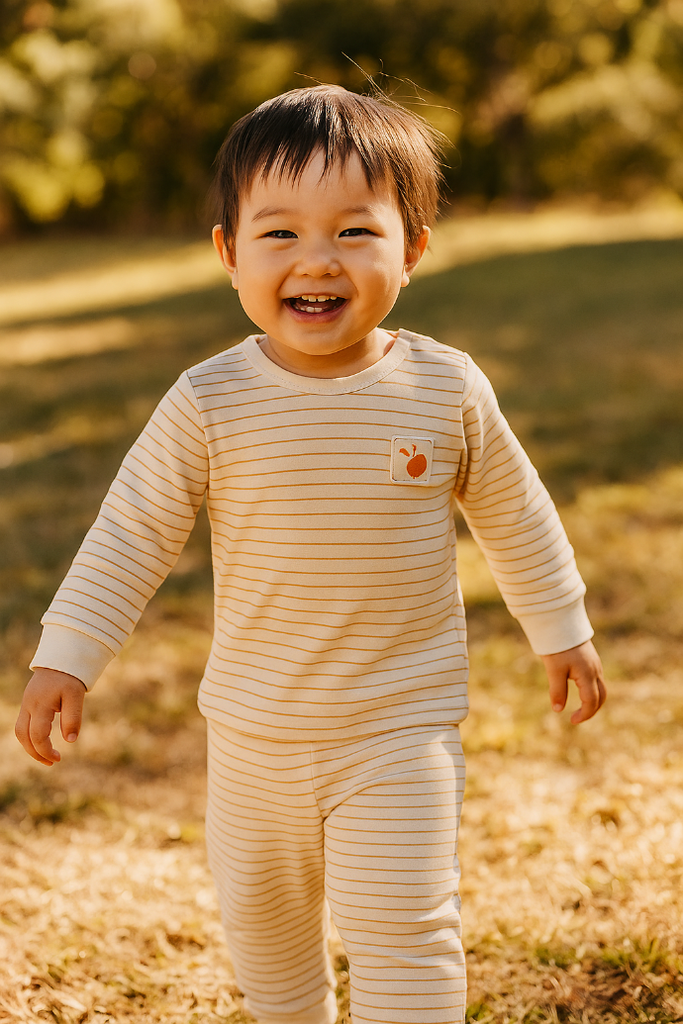20250611_1653_Striped Baby Bodysuit_remix_01jxf6e62bf2nrgn44735nqgpy.webp